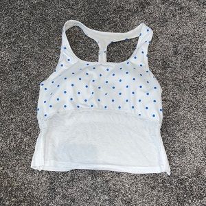 Fabletics blue and white polka dot workout top size medium
